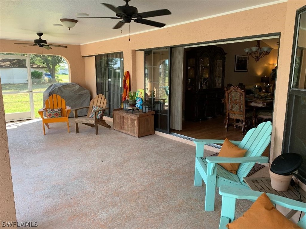 26324 Hong Kong Road Punta Gorda, FL 33983 - Photo 3 of 18 a living room filled with furniture