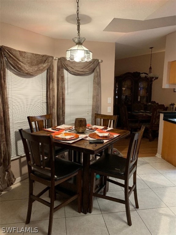 26324 Hong Kong Road Punta Gorda, FL 33983 - Photo 5 of 18 a view of a dining room with furniture