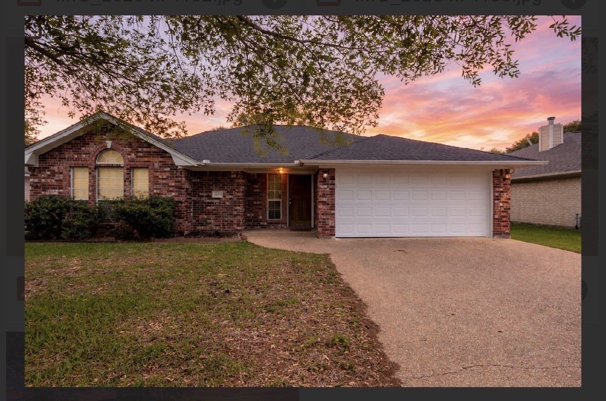 4802 Treadgold Lane Bryan, TX 77802 - Photo 1 of 28 a front view of a house with garden
