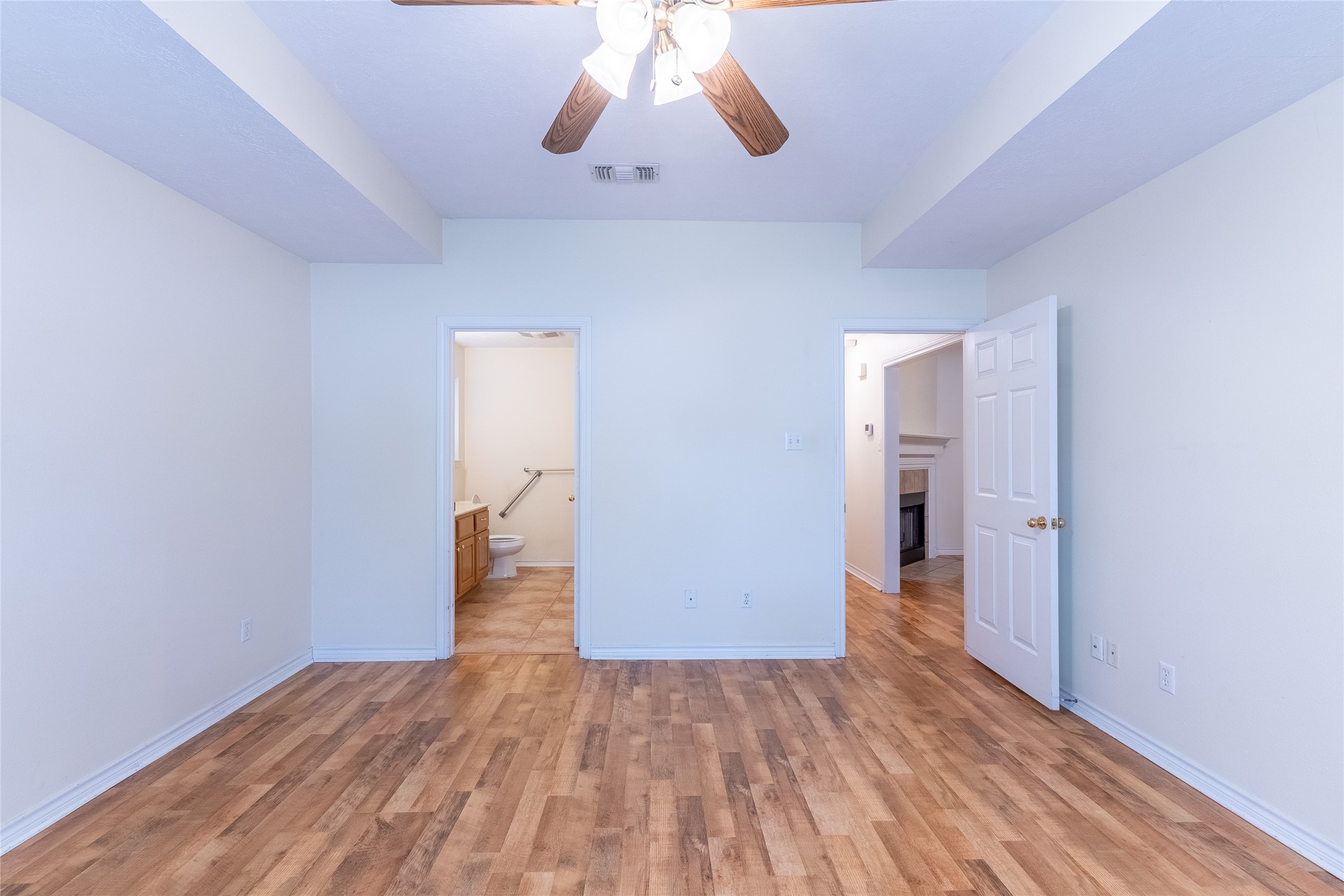 4802 Treadgold Lane Bryan, TX 77802 - Photo 14 of 28 a view of empty room with wooden floor