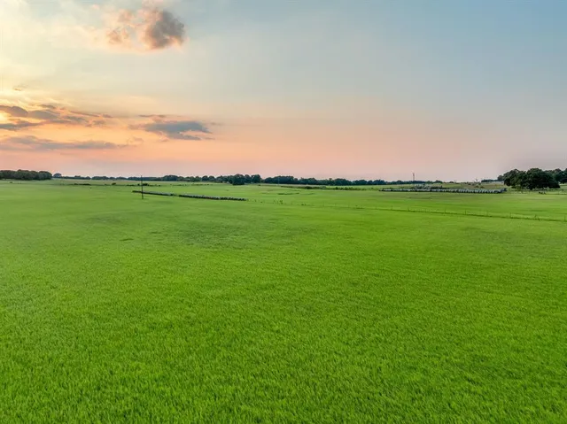 an aerial view of a houses with outdoor space