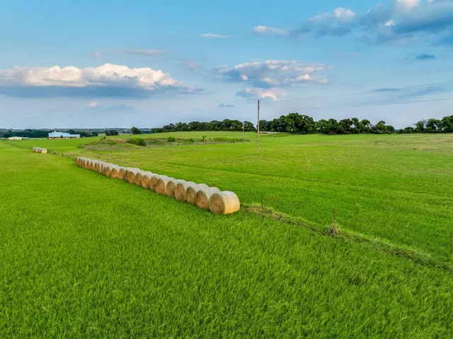 a view of yard with swimming pool and outdoor space