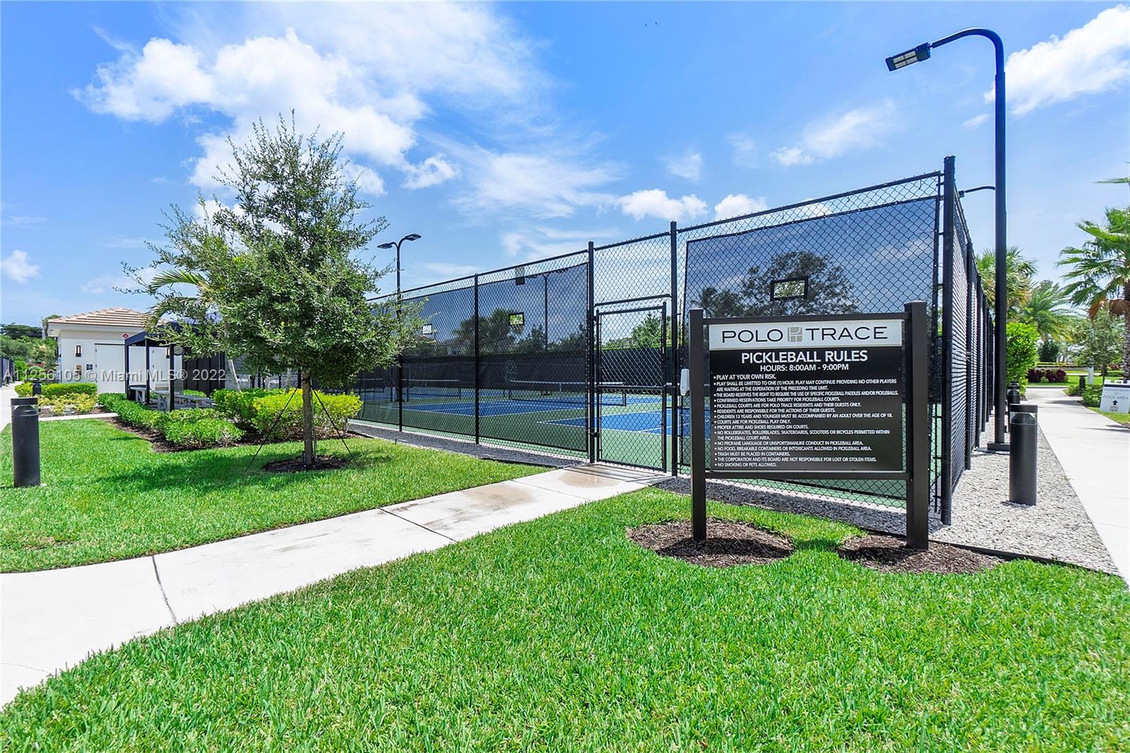 7677 Doubleton Drive Delray Beach, FL 33446 - Photo 37 of 42 a view of a park