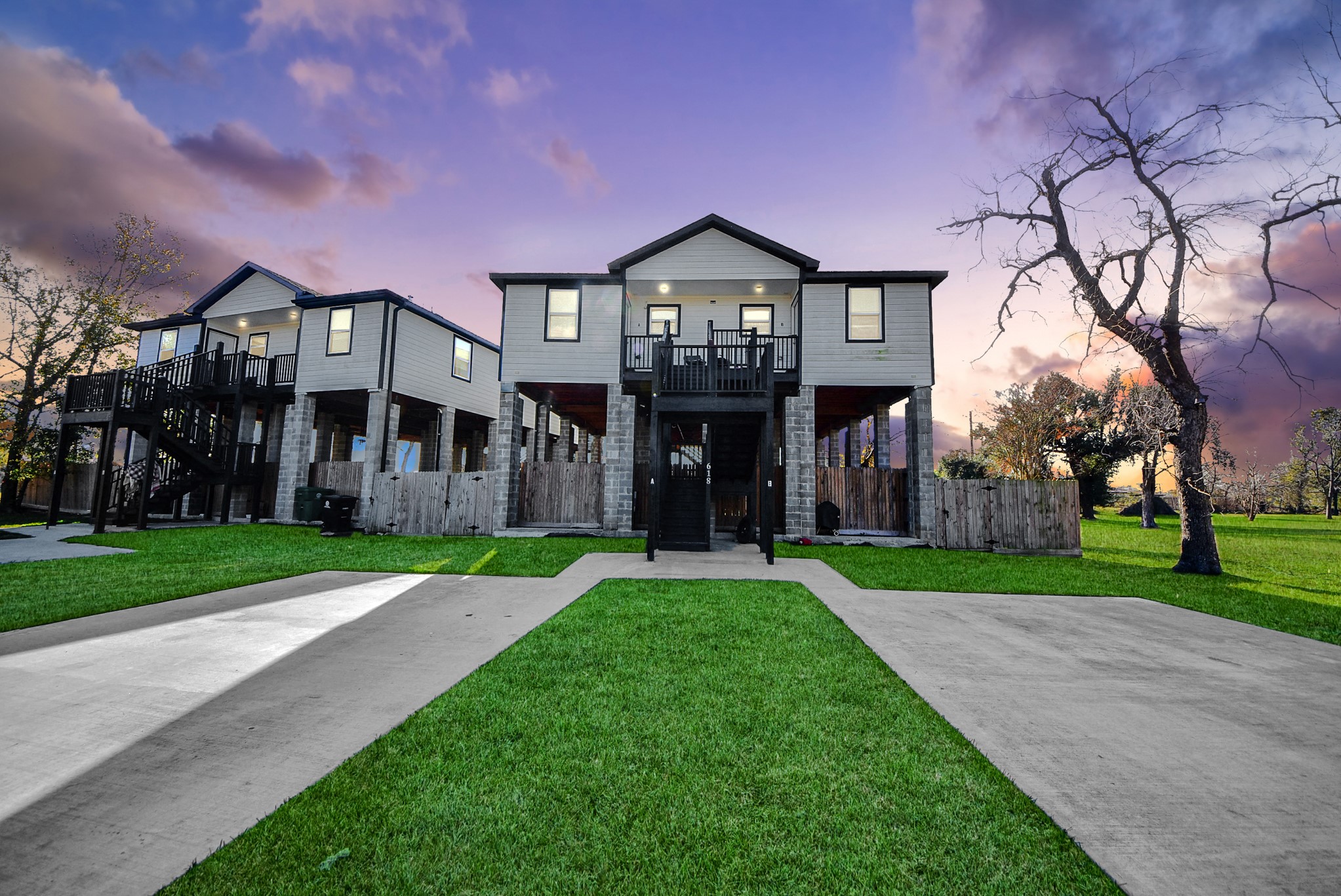 618 Maple Way, Unit A Houston, TX 77015 - Photo 2 of 48 a front view of a house with a yard and garage