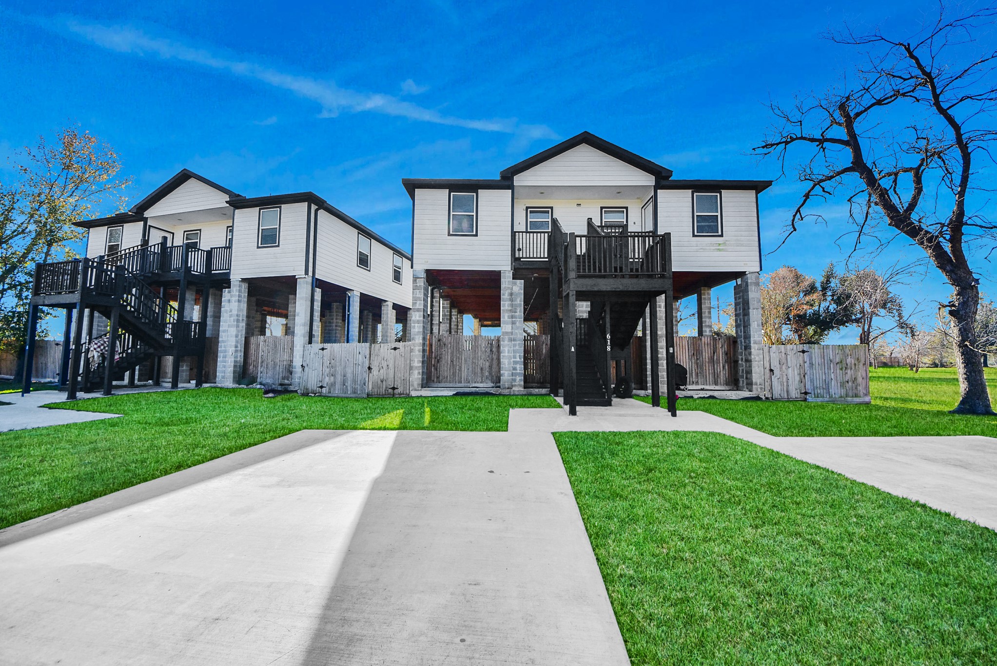 618 Maple Way, Unit A Houston, TX 77015 - Photo 42 of 48 a view of a big house with a big yard and large trees