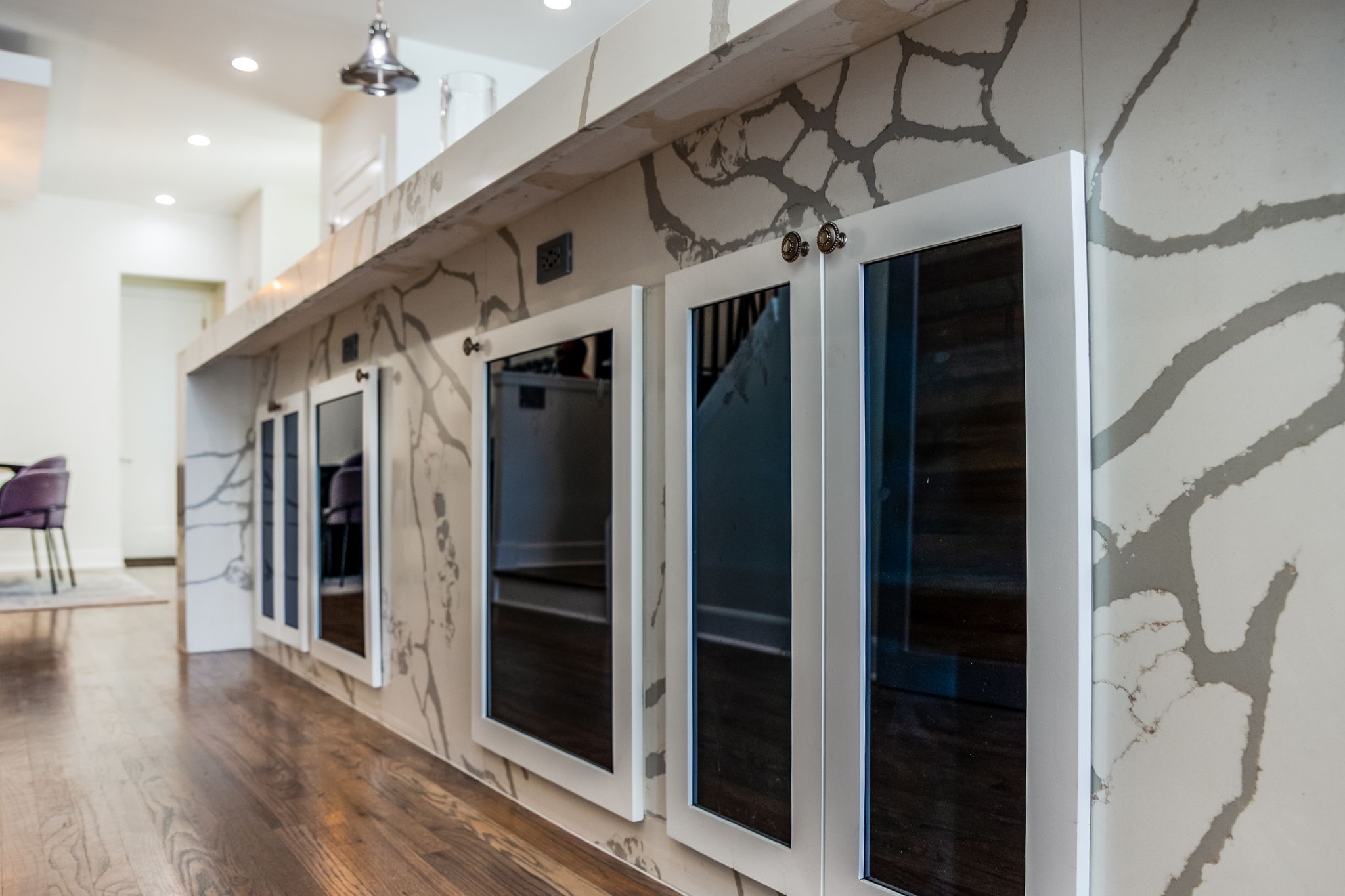 2124 Banks Street Houston, TX 77098 - Photo 11 of 46 a view of a hallway with wooden floor and staircase
