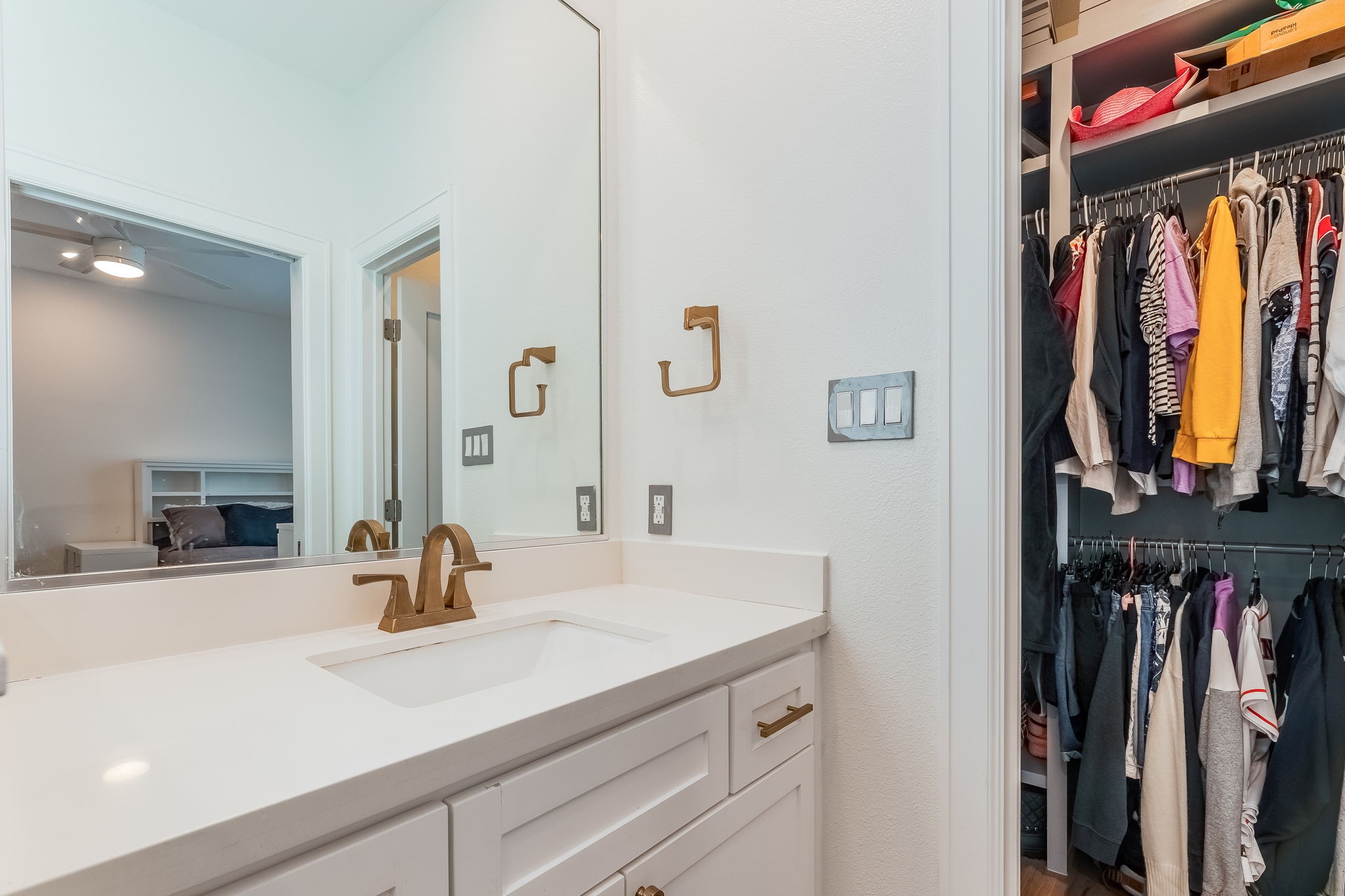 2124 Banks Street Houston, TX 77098 - Photo 23 of 46 a bathroom with a sink and a mirror