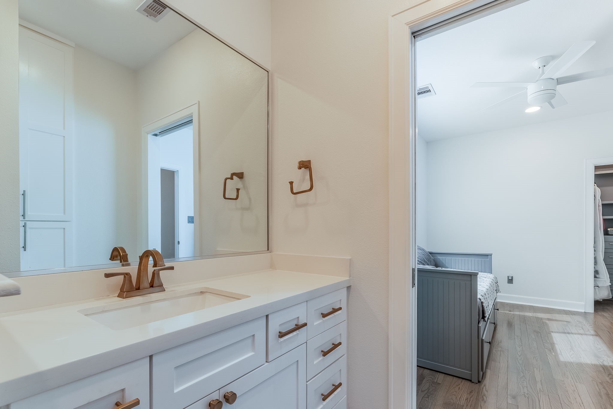 2124 Banks Street Houston, TX 77098 - Photo 27 of 46 a bathroom with a sink and a mirror