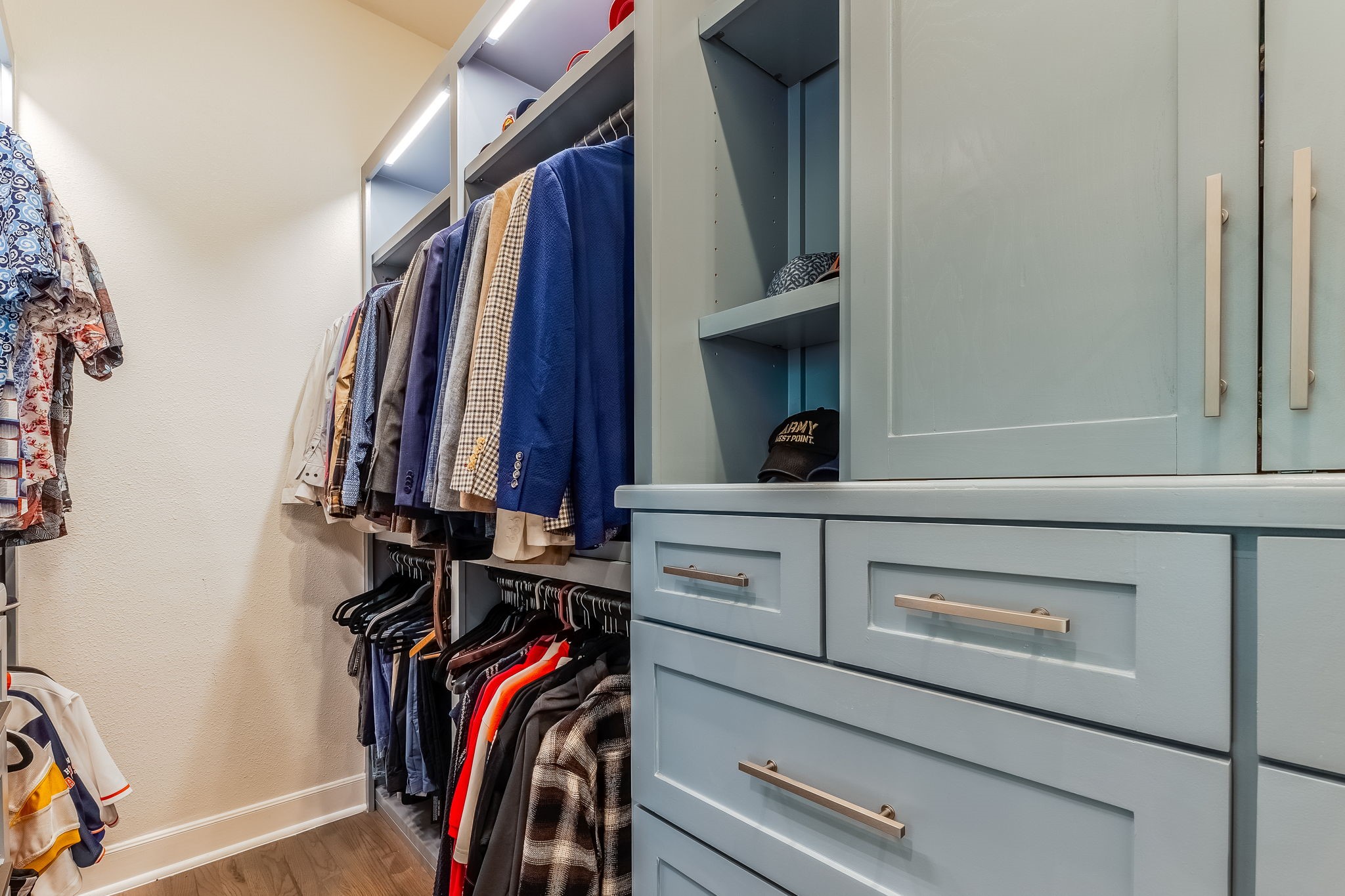 2124 Banks Street Houston, TX 77098 - Photo 40 of 46 a view of walk in closet with clothes