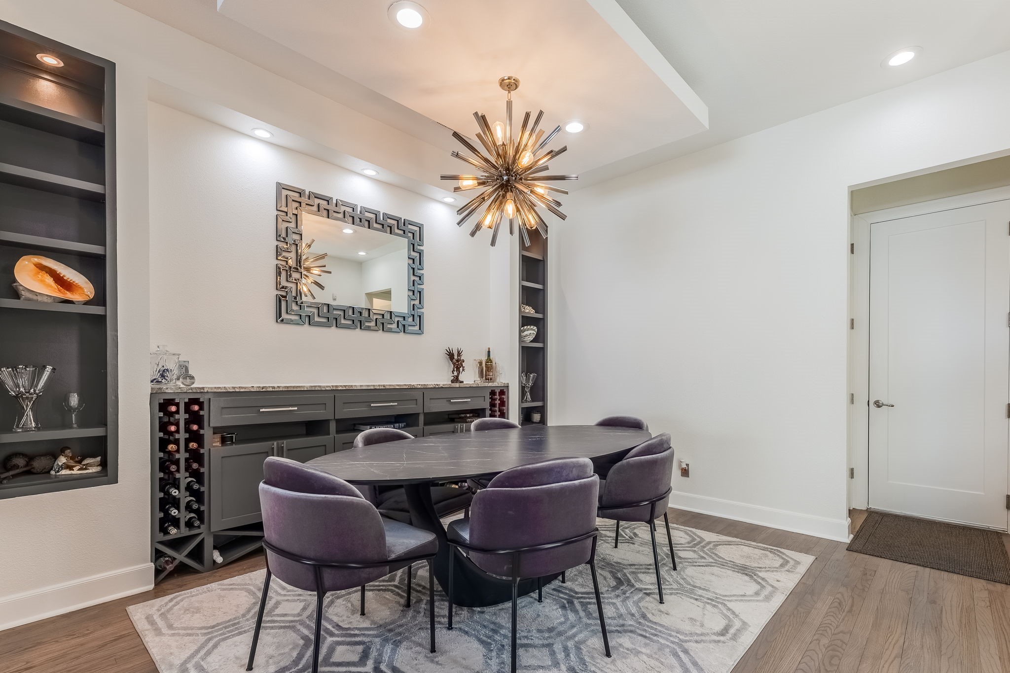 2124 Banks Street Houston, TX 77098 - Photo 5 of 46 a view of a dining room with furniture and wooden floor