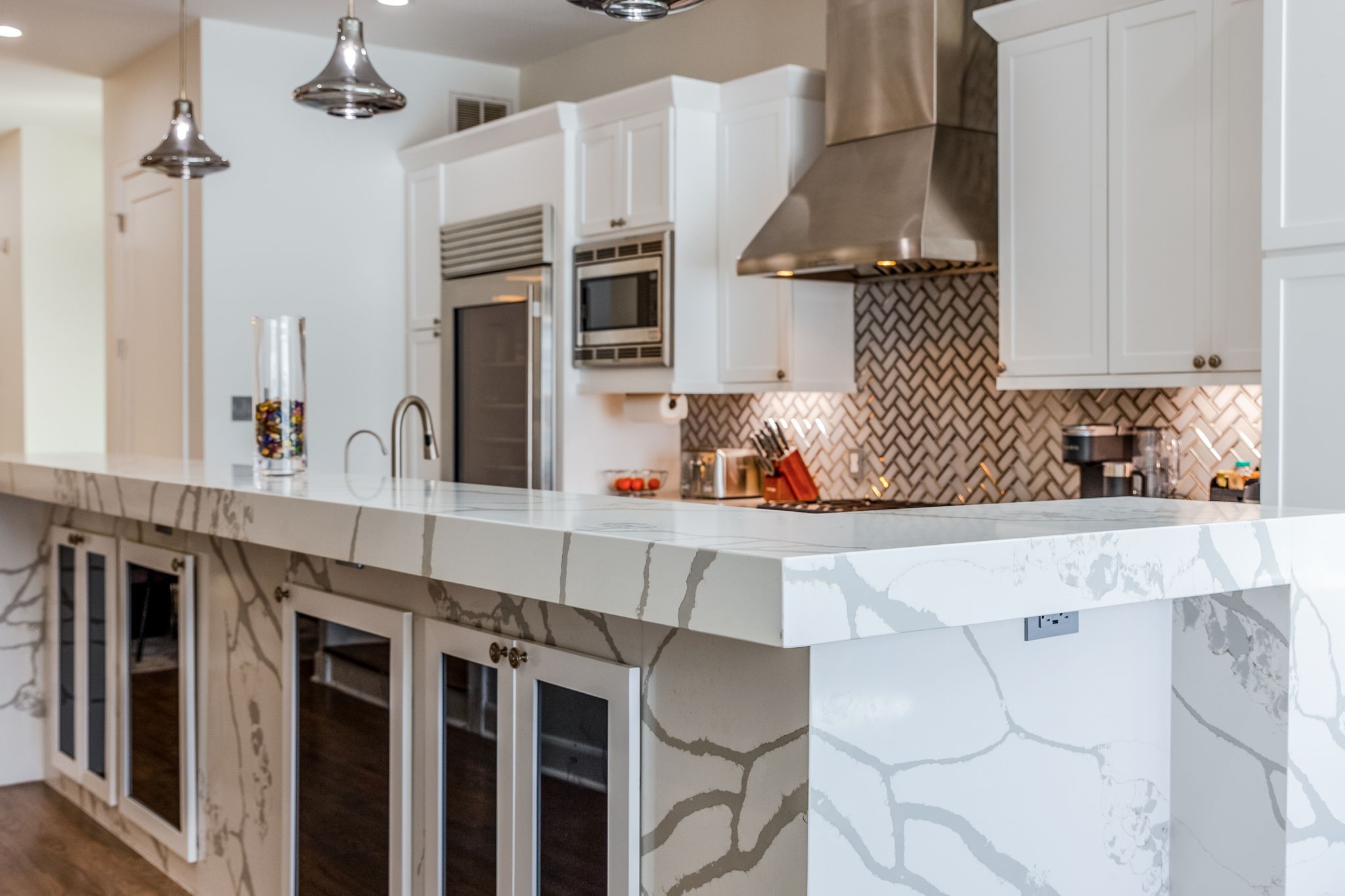 2124 Banks Street Houston, TX 77098 - Photo 10 of 46 a kitchen with stainless steel appliances a sink and cabinets