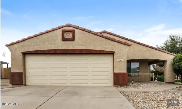 a front view of a house with yard