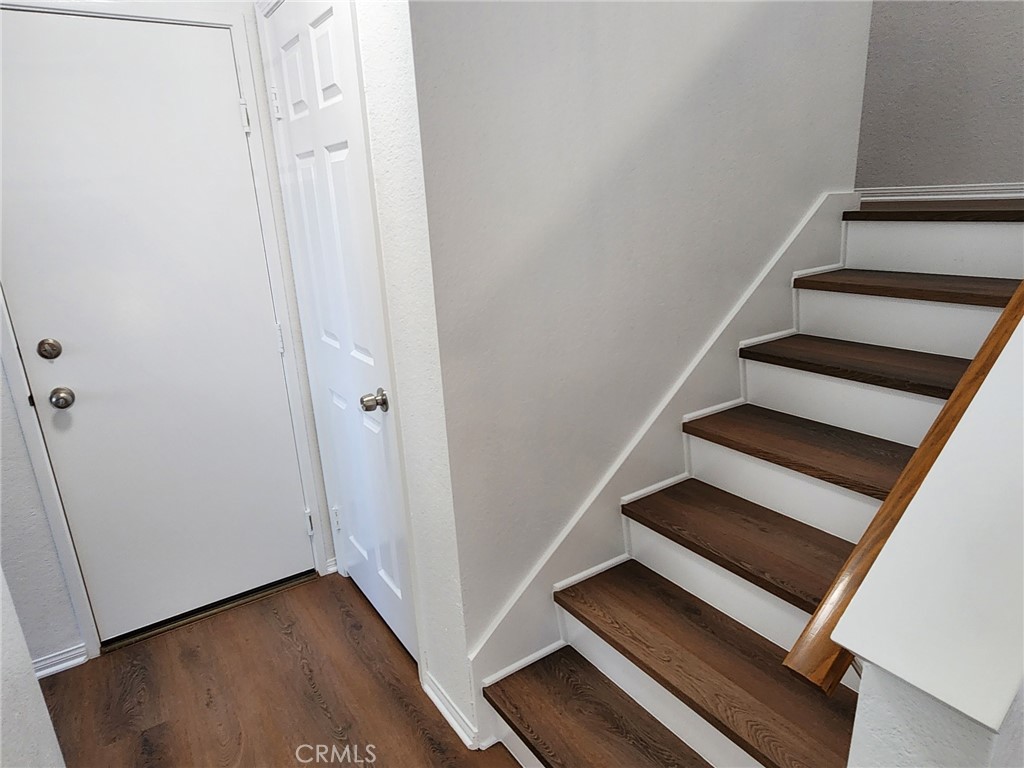520 Claraday Street, Unit 1 Glendora, CA 91740 - Photo 6 of 16 an entryway in a hall with wooden floor