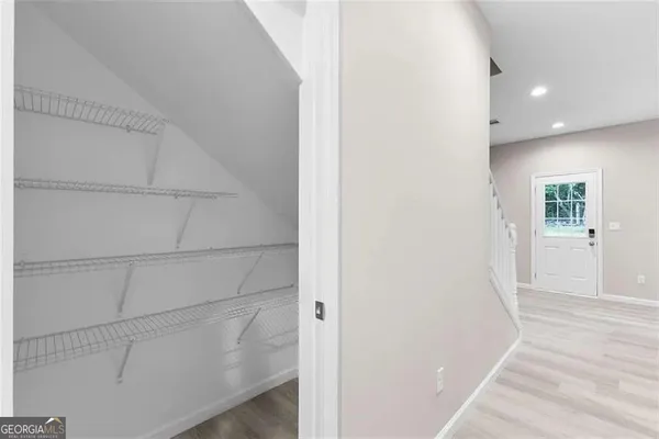 a view of an empty walk in closet