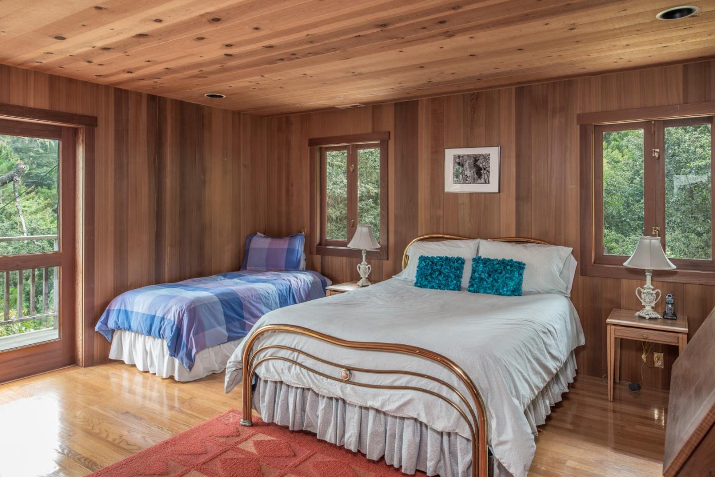246 Highway 1 Carmel, CA 93923 - Photo 20 of 37 a bedroom with two beds and large window