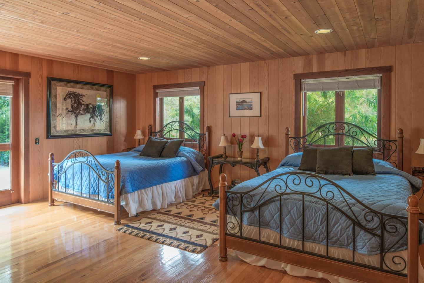 246 Highway 1 Carmel, CA 93923 - Photo 22 of 37 a bedroom with furniture and a window