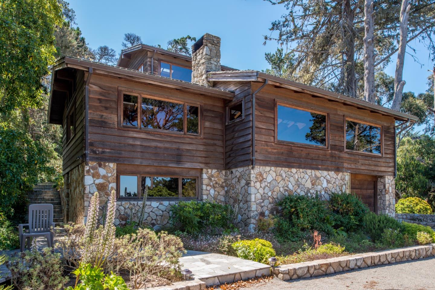 246 Highway 1 Carmel, CA 93923 - Photo 30 of 37 a front view of a house with a yard