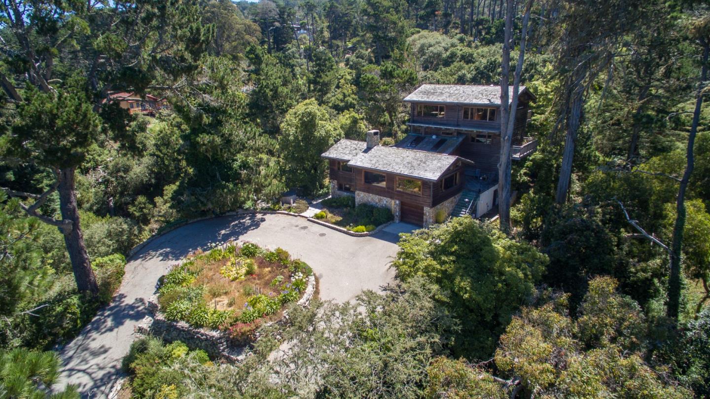 246 Highway 1 Carmel, CA 93923 - Photo 34 of 37 an aerial view of a house with a yard and large trees