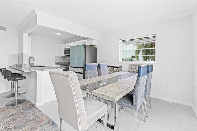a view of a dining room with furniture