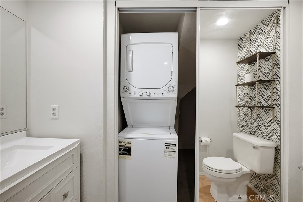 8167 Vineyard Avenue, Unit 47 Rancho Cucamonga, CA 91730 - Photo 19 of 22 a bathroom with a toilet and a sink
