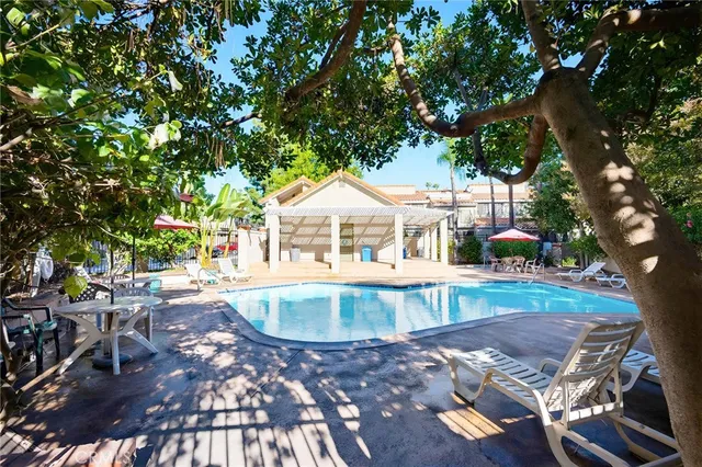 a view of yard with swimming pool