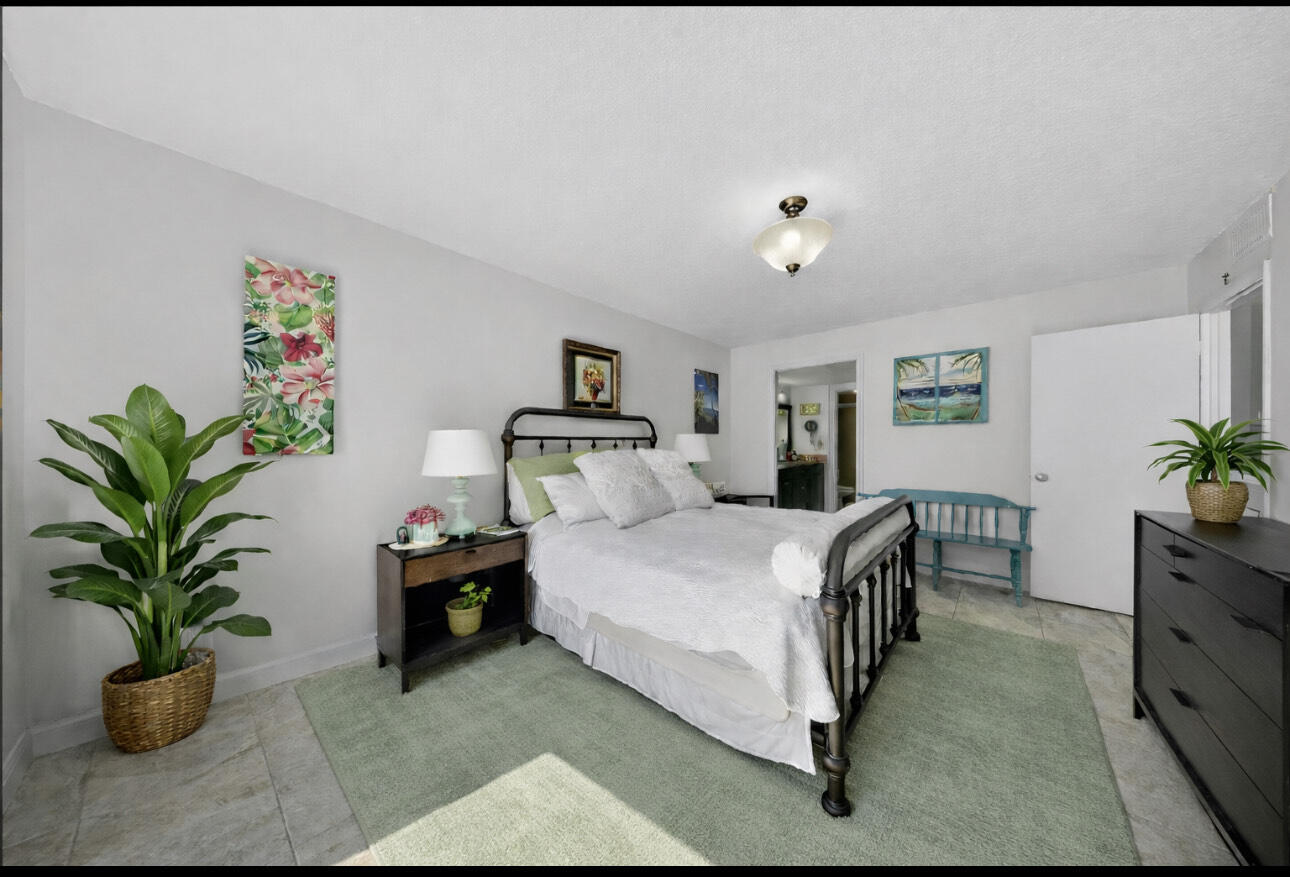 3206 South Lakeview Circle, Unit 1101 Fort Pierce, FL 34949 - Photo 17 of 38 primary suite