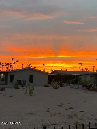 a view of a road with an ocean