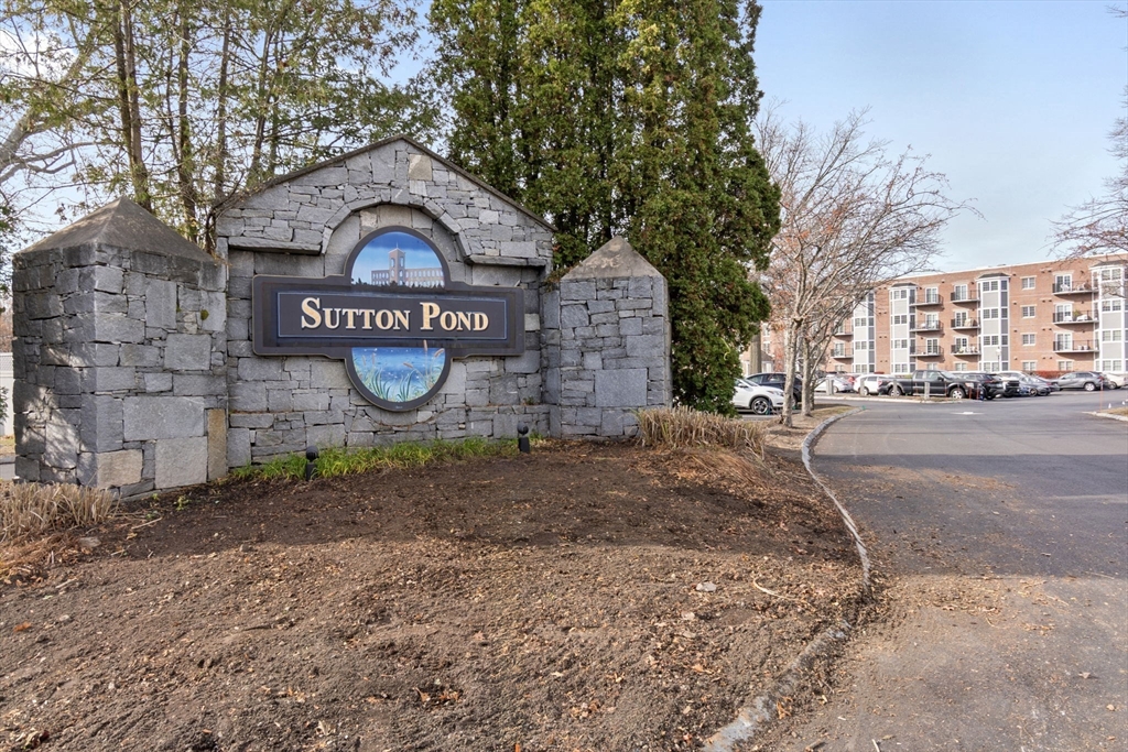 148 Main Street, Unit C538 North Andover, MA 01845 - Photo 1 of 23 a view of a street with sign board