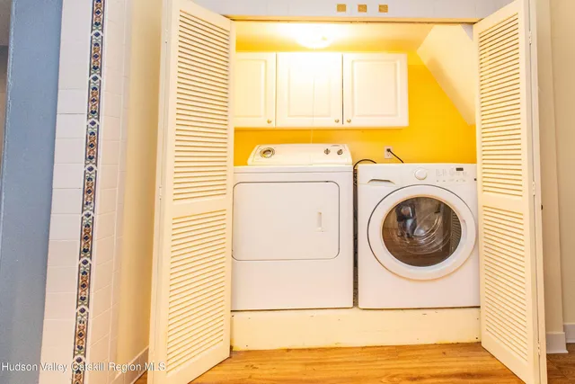 a view of a storage & utility room with washer and dryer