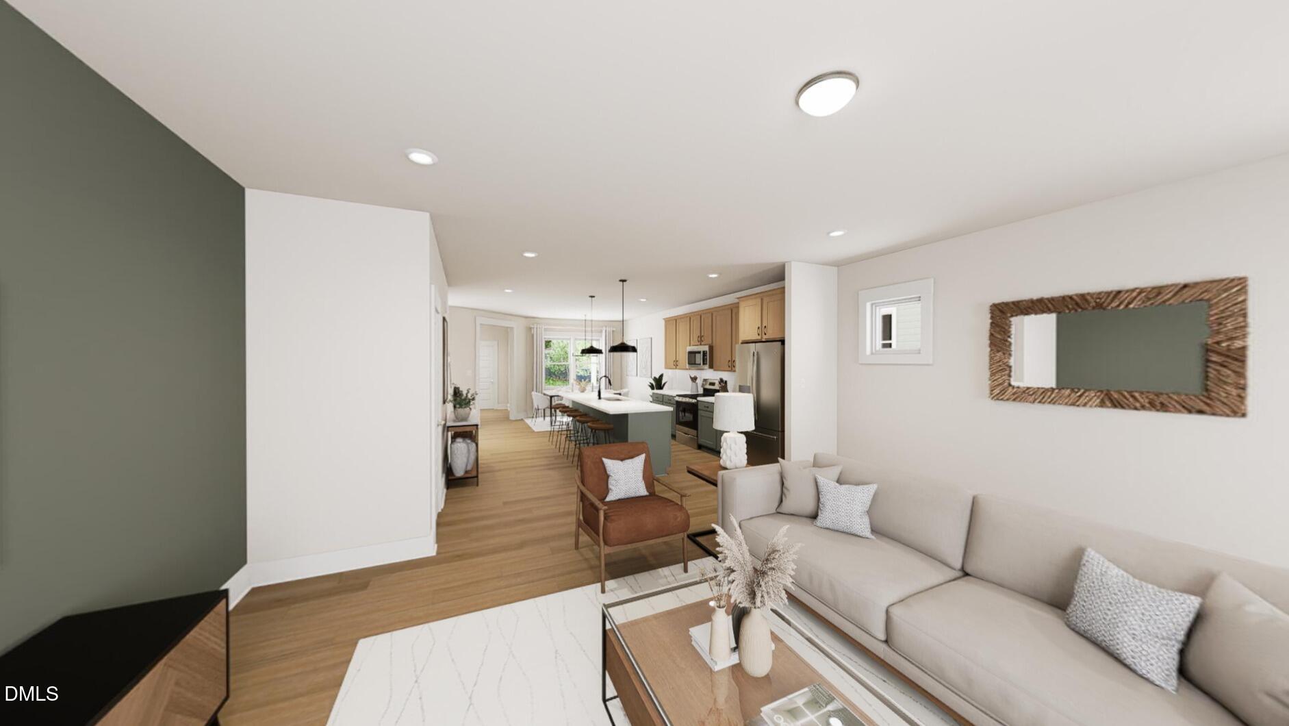 545 Folk Song Way Wendell, NC 27591 - Photo 7 of 27 a living room with furniture and a wooden floor