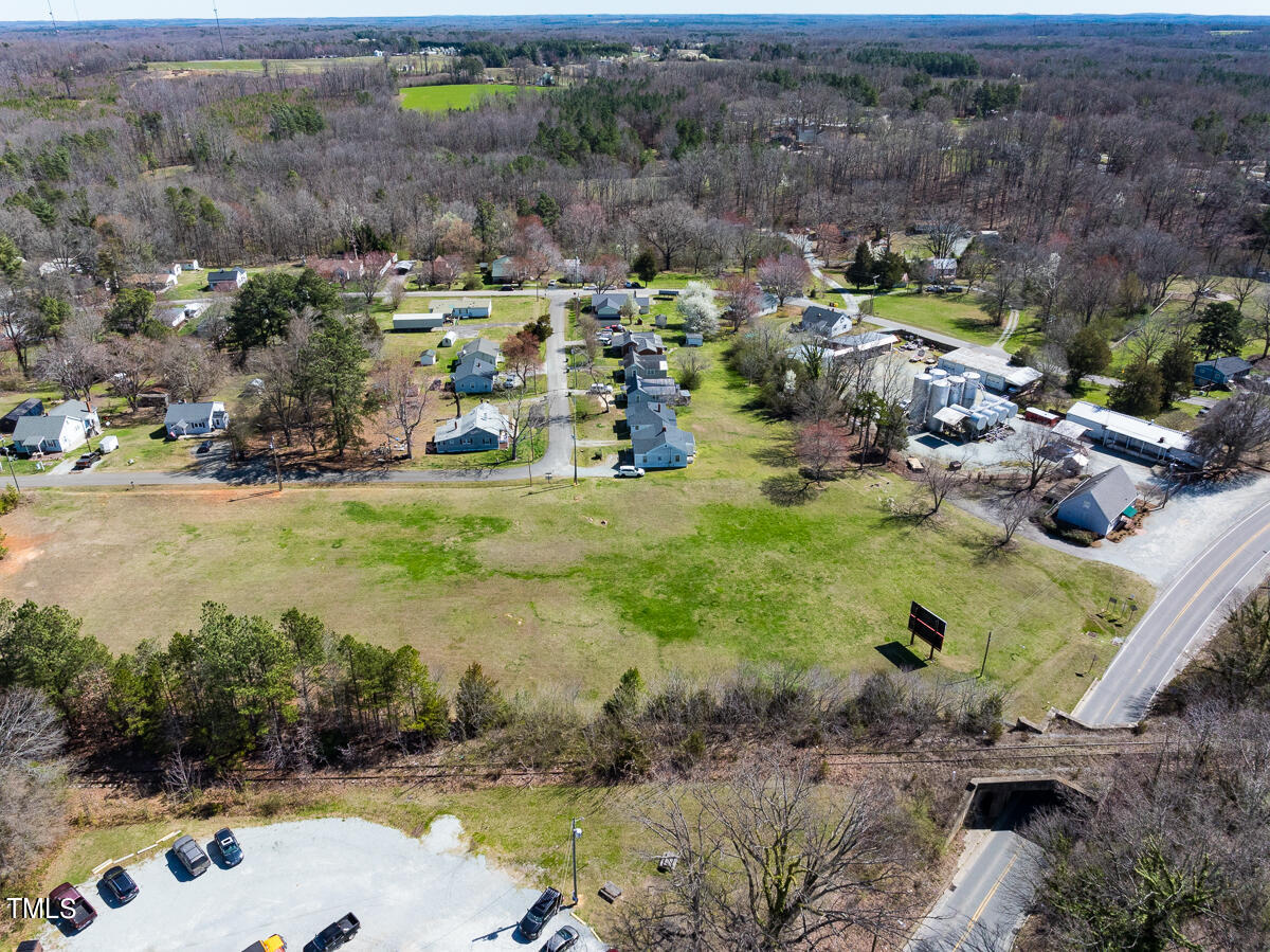 121 Old Durham Road Roxboro, NC 27573 - Photo 15 of 59 a view of a lake with lots of residential buildings