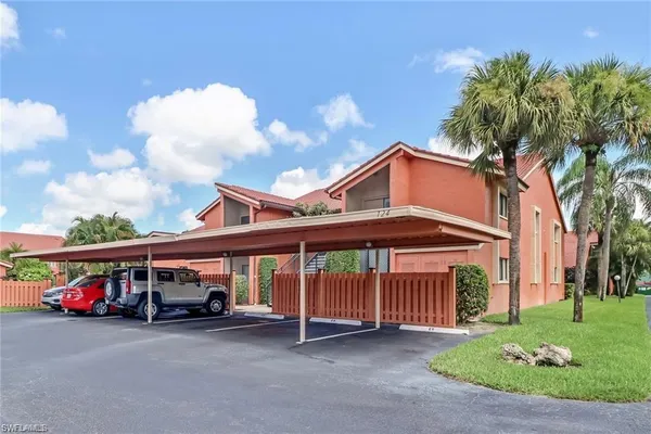a view of a house with a yard and balcony