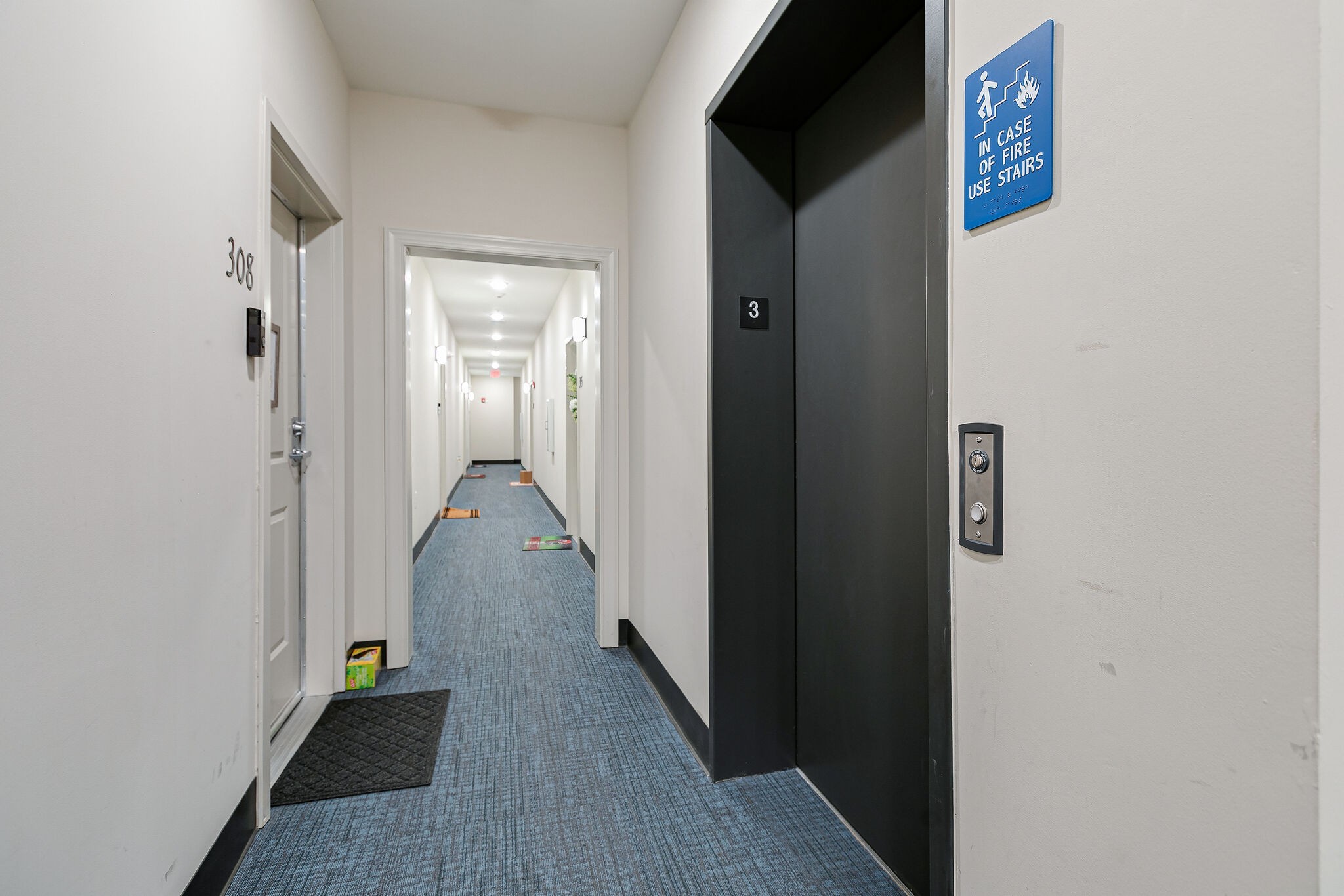 1319 West Main Street, Unit 303 Franklin, TN 37064 - Photo 13 of 23 a view of a hallway with wooden floor