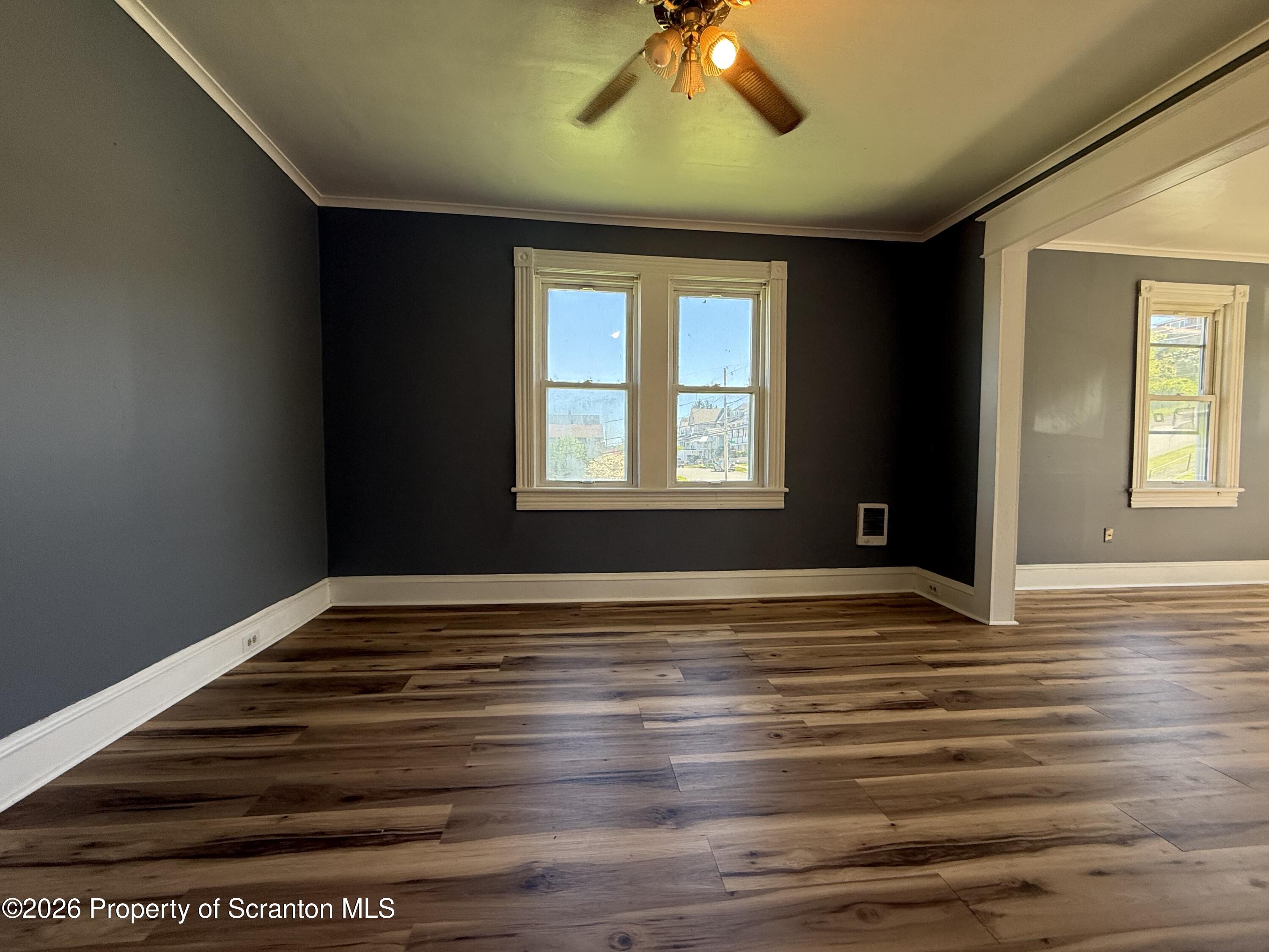 1706 Prospect Avenue, Unit 2 Scranton, PA 18505 - Photo 13 of 16 a view of an empty room with window and wooden floor