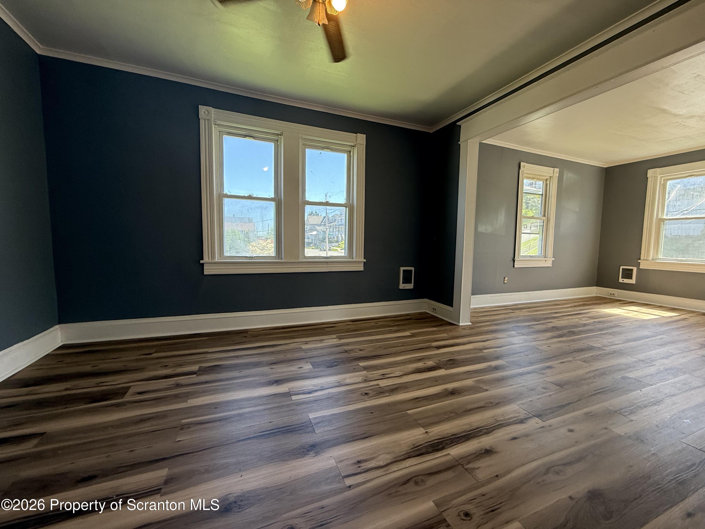 1706 Prospect Avenue, Unit 2 Scranton, PA 18505 - Photo 14 of 16 a view of an empty room with window and wooden floor