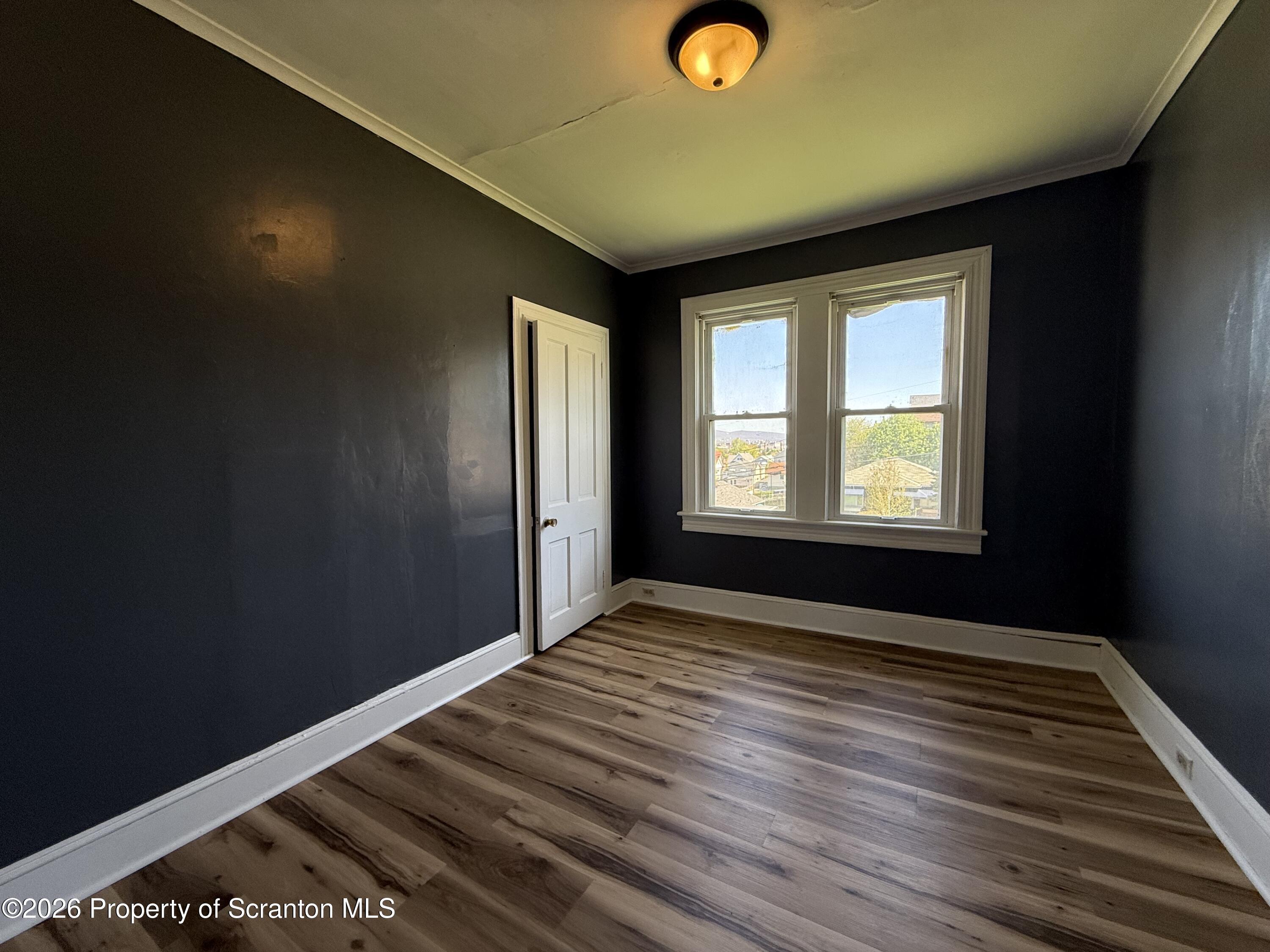 1706 Prospect Avenue, Unit 2 Scranton, PA 18505 - Photo 9 of 16 a view of an empty room and window
