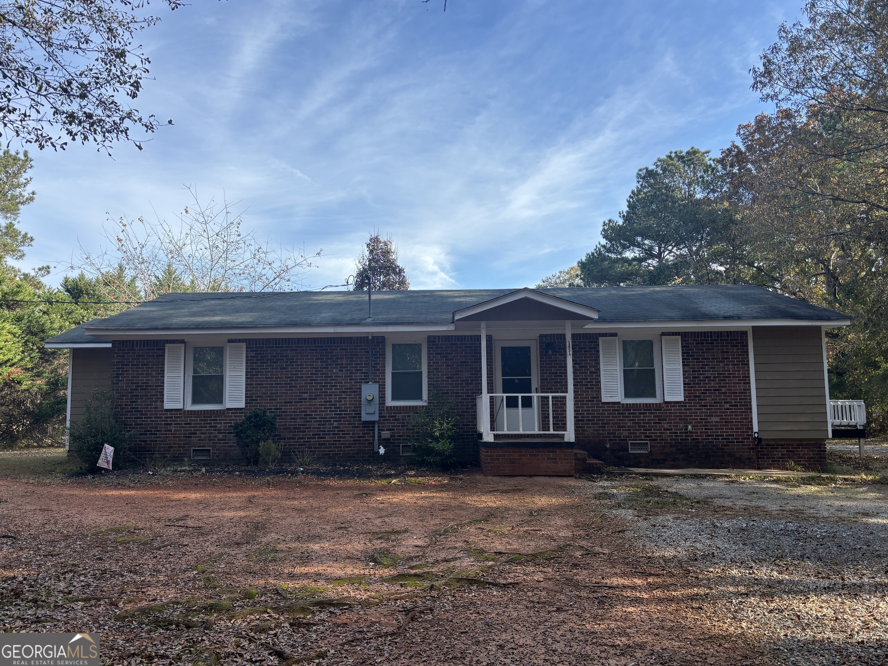 1451 Prospect Road Madison, GA 30650 - Photo 1 of 1 front view of a house with a yard