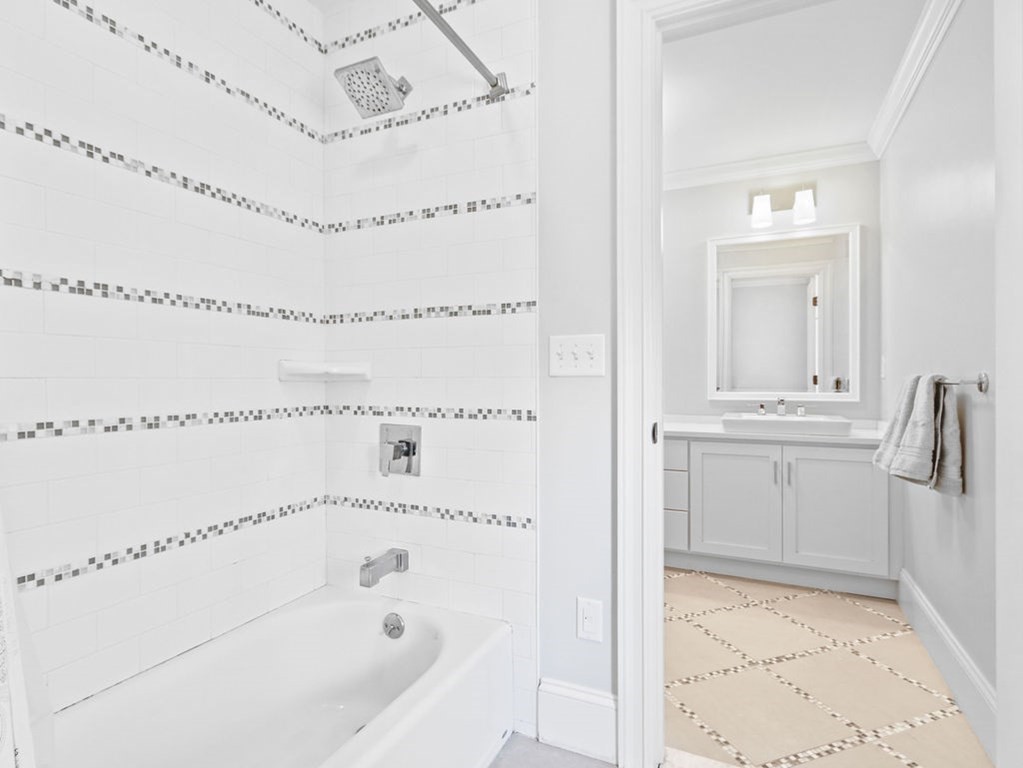 78 Mayflower Road Needham, MA 02492 - Photo 24 of 30 a bathroom with a bathtub and a shower