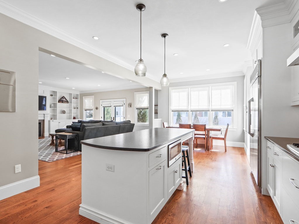 78 Mayflower Road Needham, MA 02492 - Photo 7 of 30 a view of kitchen and dining room with wooden floor