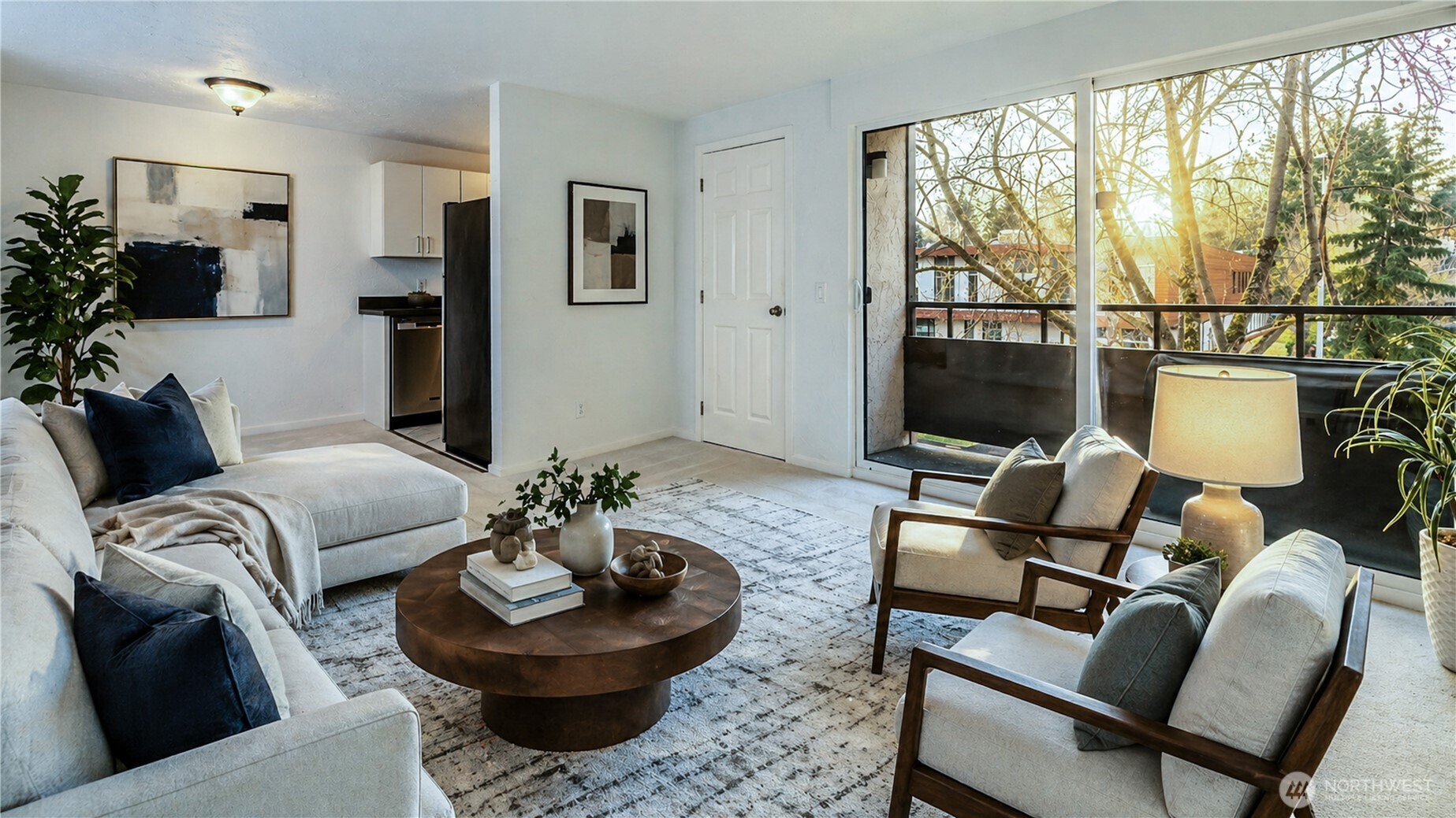 2100 North 106th Street, Unit 307 Seattle, WA 98133 - Photo 1 of 11 a living room with furniture and a flat screen tv