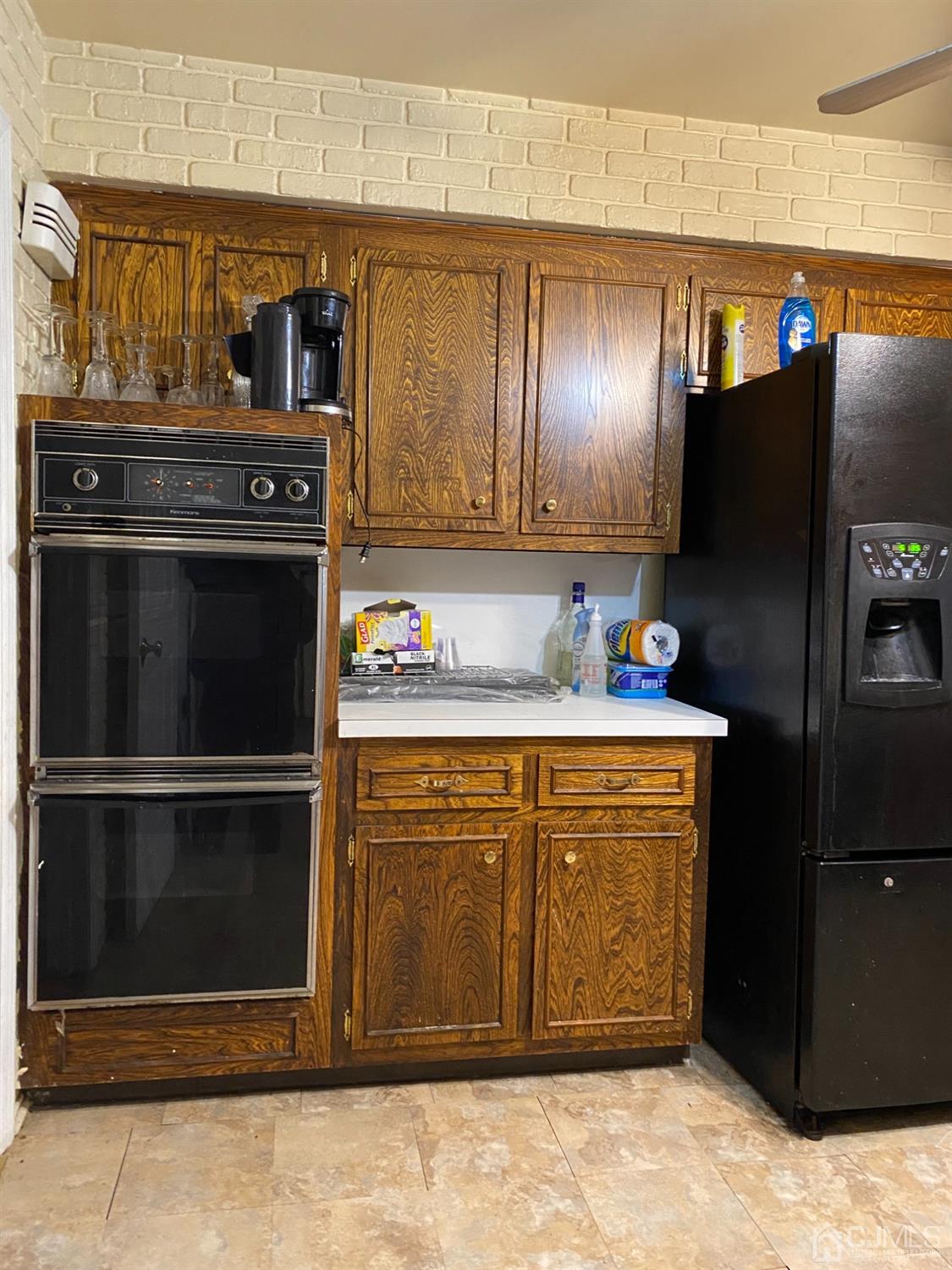 230 Austin Road Orange, NJ 07050 - Photo 13 of 34 a kitchen with granite countertop stainless steel appliances and counter space