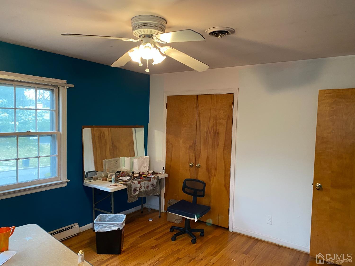 230 Austin Road Orange, NJ 07050 - Photo 25 of 34 a view of a workspace with furniture and a window