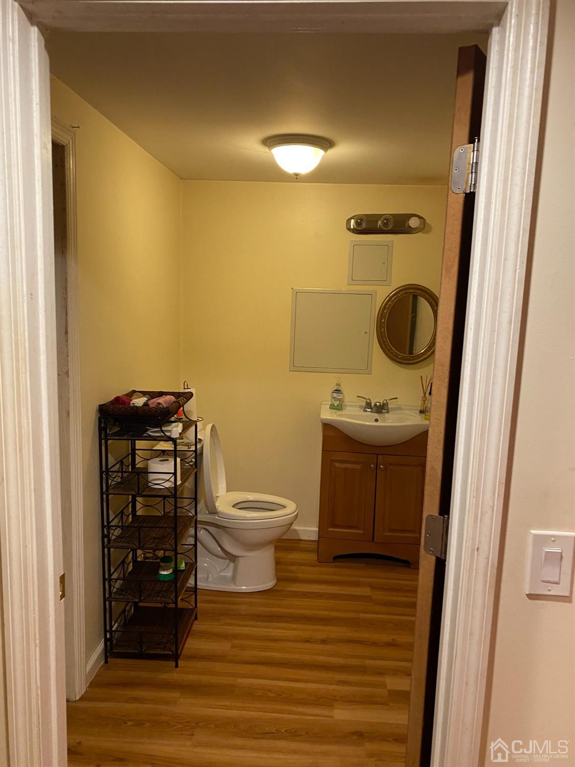 230 Austin Road Orange, NJ 07050 - Photo 31 of 34 a bathroom with a toilet and a sink