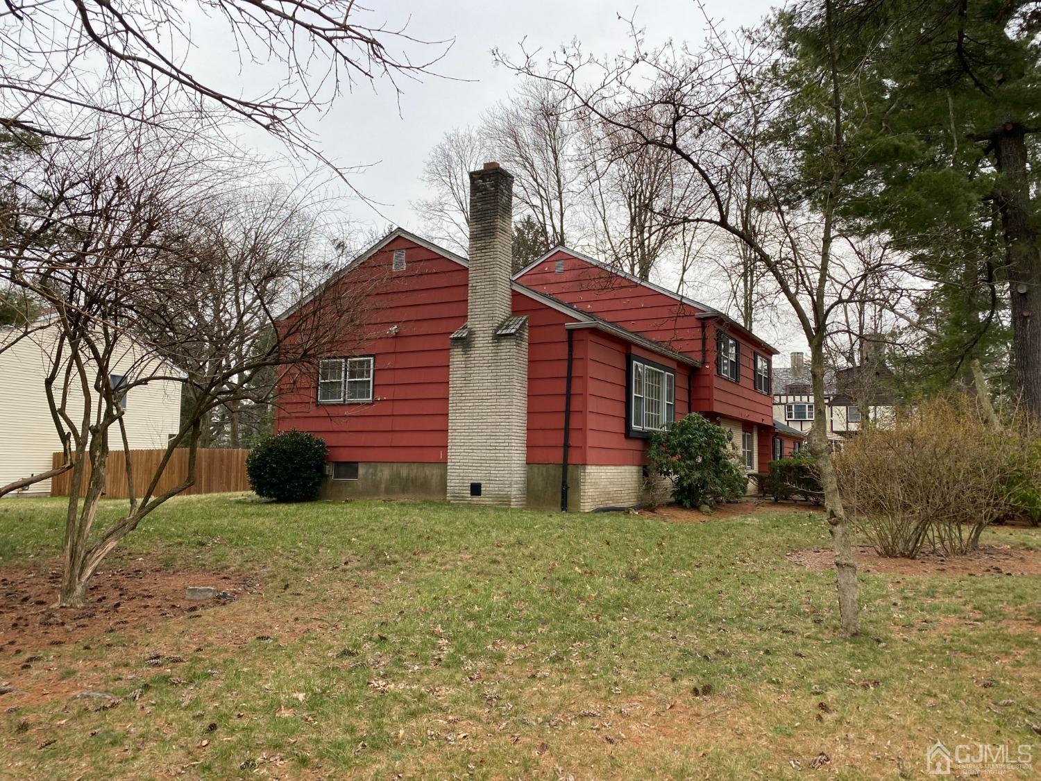 230 Austin Road Orange, NJ 07050 - Photo 4 of 34 a view of a house with a yard