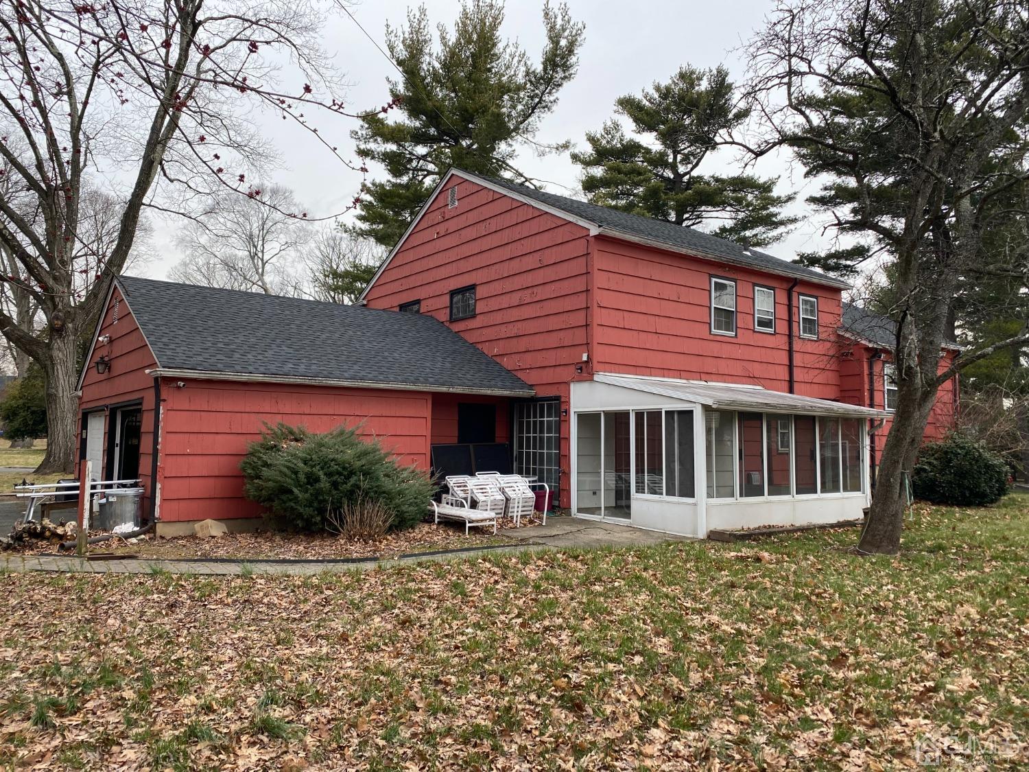 230 Austin Road Orange, NJ 07050 - Photo 5 of 34 a front view of a house with garden