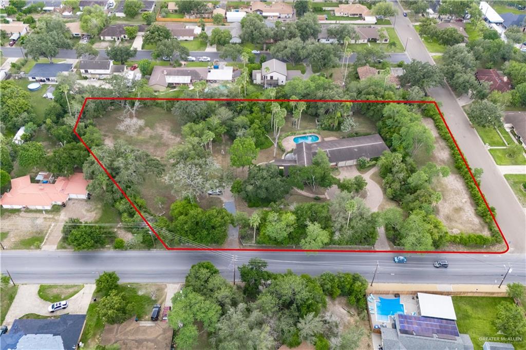 1131 West 6th Street Weslaco, TX 78596 - Photo 2 of 45 an aerial view of residential houses with outdoor space and street view
