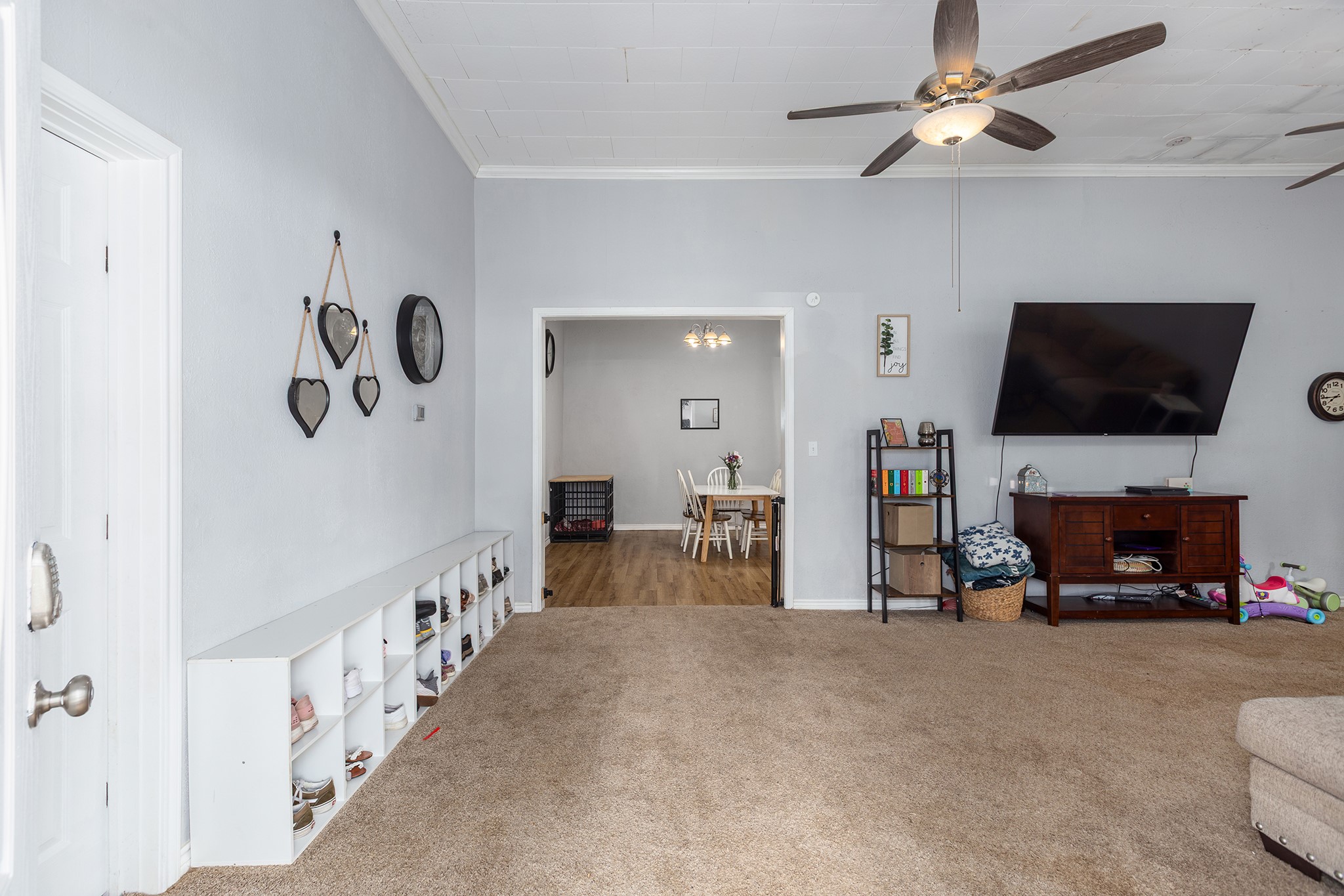 240 North 7th Street Trinity, TX 75862 - Photo 12 of 32 a view of a livingroom with furniture and a flat screen tv