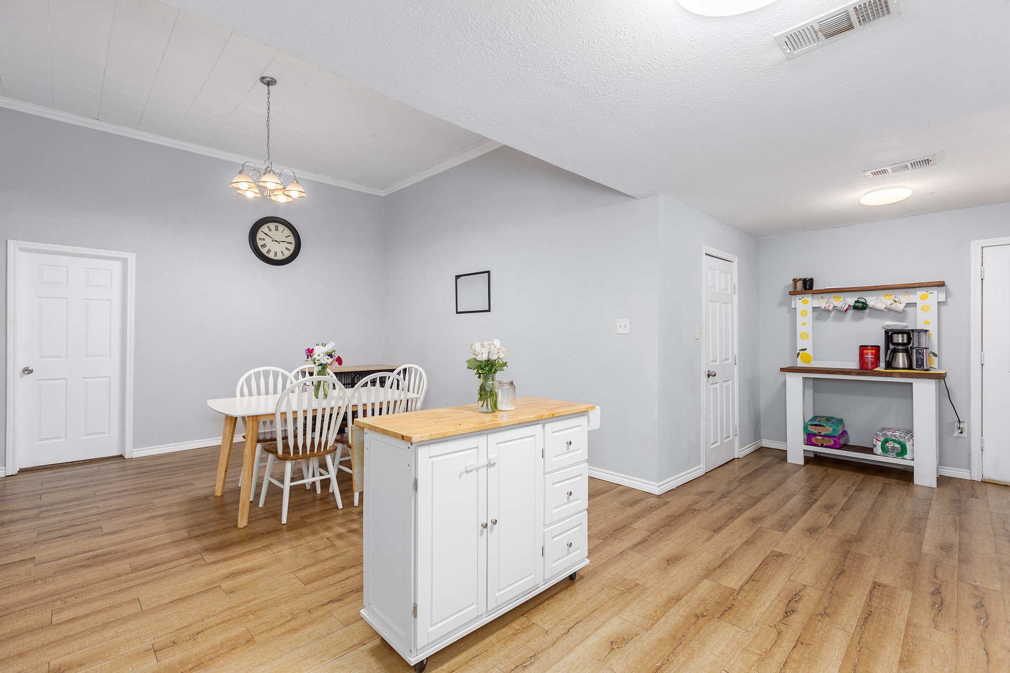 240 North 7th Street Trinity, TX 75862 - Photo 20 of 32 a view of a dining room with furniture and wooden floor