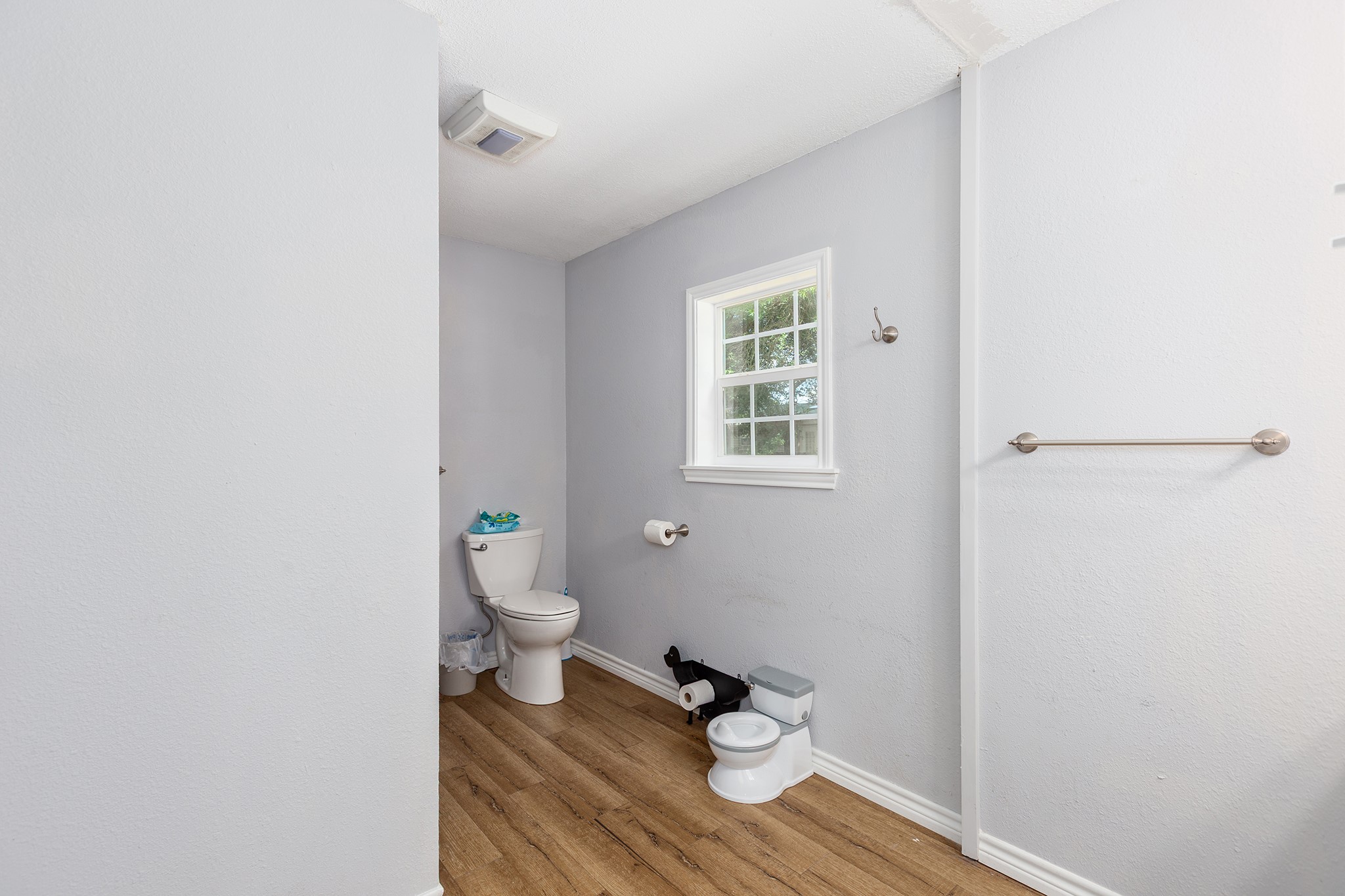 240 North 7th Street Trinity, TX 75862 - Photo 30 of 32 a view of empty room with wooden floor