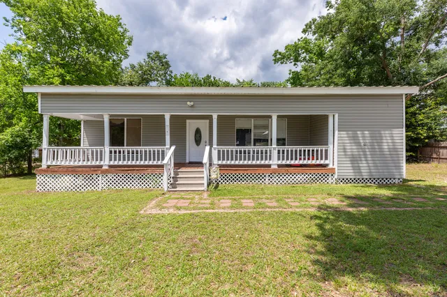 a view of a house with a swimming pool